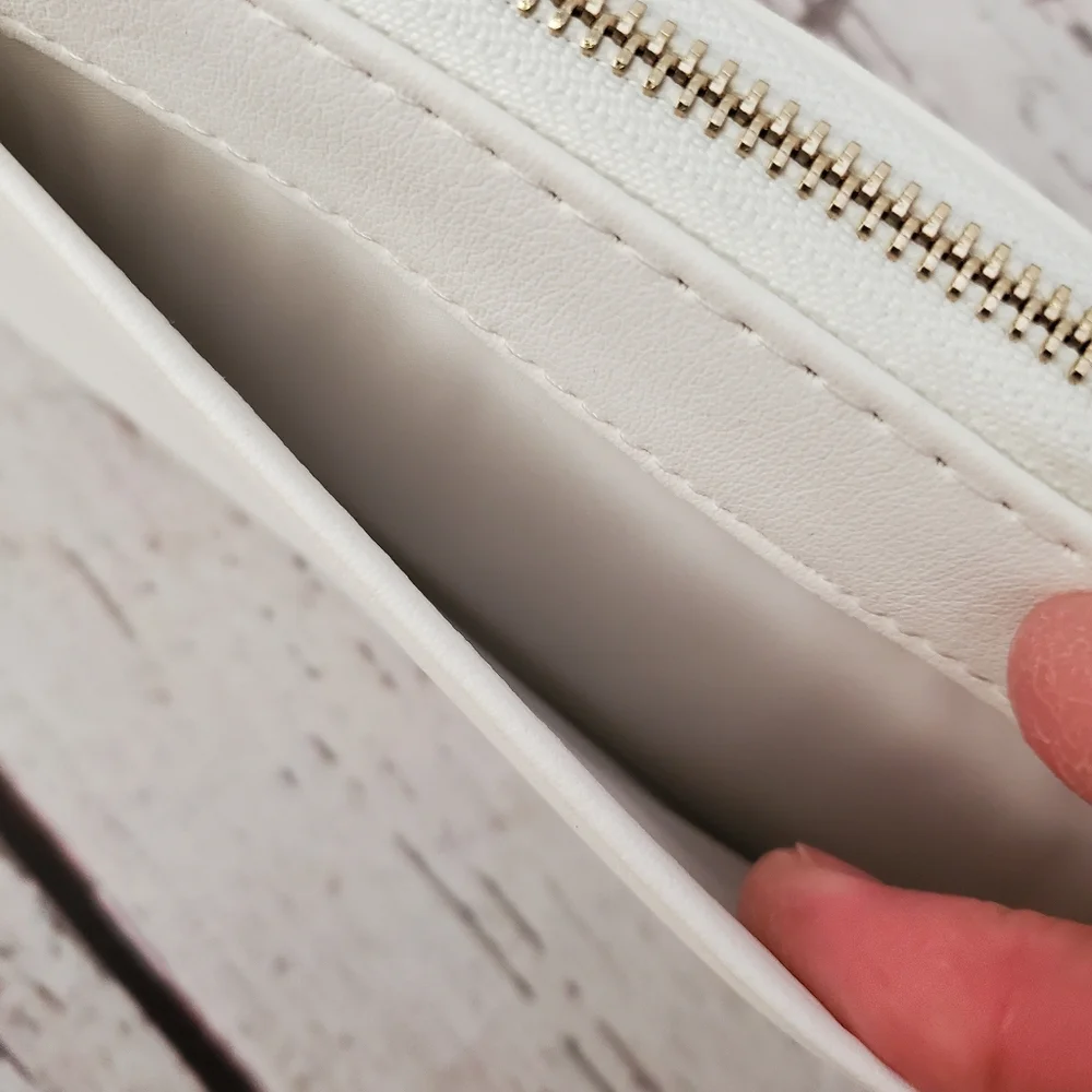 No Boundaries women's vinyl zip around wallet wristlet white